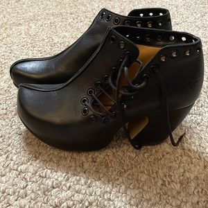 Black pair of Fluevog shoes . Size 8